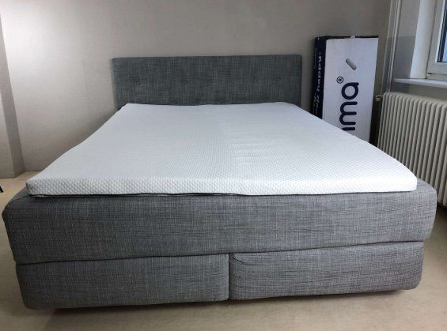 emma mattress topper on bed